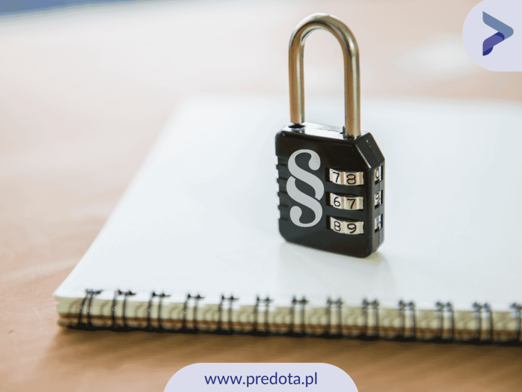 Kłódka na dokumentach - ilustracja do artykułu o tym czym jest tajemnica przedsiębiorstwa