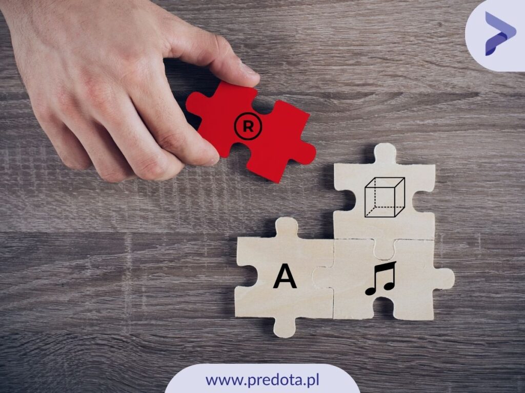 Ręka układająca puzzle - obrazek wyróżniający do artykułu o tym czym jakie są rodzaje znaków towarowych